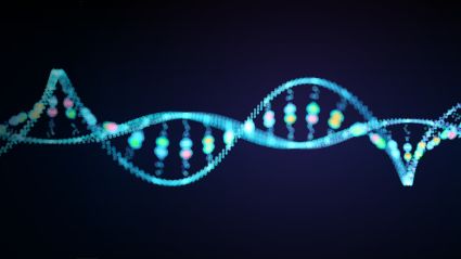 Abstract illustration of a glowing DNA double helix made of blue and multicolored light particles on a dark background.